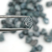 natural blue rough diamond with a raw uncut surface for jewelry designers