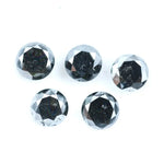 Five natural round cut black diamonds with faceted surfaces showing natural inclusions and dark carbon tones, loose untreated genuine diamonds suitable for custom jewelry making.