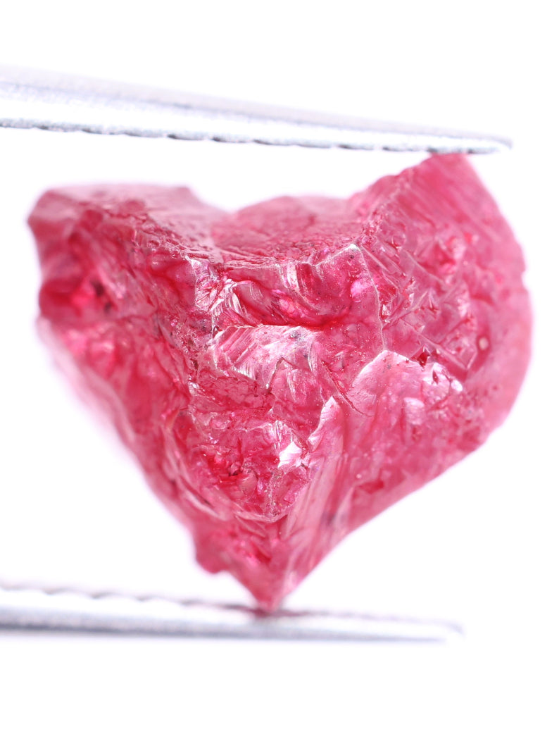 pink rough diamond on a white background