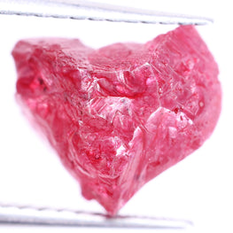 pink rough diamond on a white background