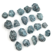 uncut blue raw diamond pieces displayed as a loose rough diamond collection
