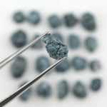 uncut blue raw diamond pieces displayed as a loose rough diamond collection