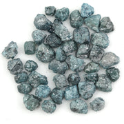 blue natural rough diamond with an uncut raw surface for custom jewelry designs