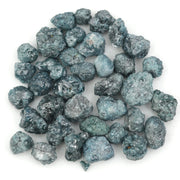blue natural rough diamond with an uncut raw surface for custom jewelry designs