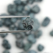 blue natural rough diamond with an uncut raw surface for custom jewelry designs