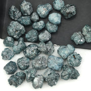 blue natural rough diamond with an uncut raw surface for custom jewelry designs