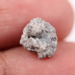 rough blue diamond and rough cut diamond ring showing rough diamond uncut rough diamond jewelry rough diamond prices and how to identify a black diamond