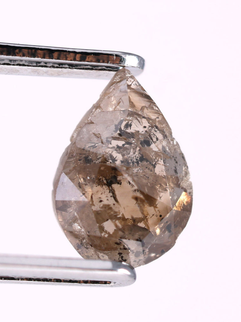 0.52 CT Pear Shape Brown Earth Mined Fancy Natural Diamond