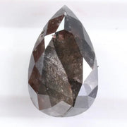 1.31 Ct pear cut black natural diamond loose stone with deep rich color and brilliance for engagement rings and custom jewelry.