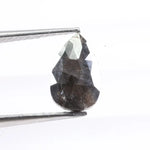 1.31 Ct pear cut black natural diamond loose stone with deep rich color and brilliance for engagement rings and custom jewelry.