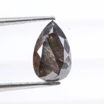 1.31 Ct pear cut black natural diamond loose stone with deep rich color and brilliance for engagement rings and custom jewelry.