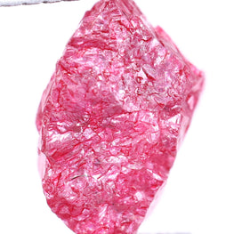 Pink rough diamond on a white background