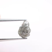 unpolished diamond showing what does a diamond in the rough look like and what does a real diamond look like with natural cut diamond and natural diamond chain details