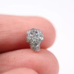 unpolished diamond showing what does a diamond in the rough look like and what does a real diamond look like with natural cut diamond and natural diamond chain details