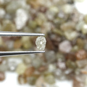 mixed color natural rough diamond pieces with varied raw textures for custom jewelry