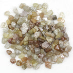 mixed color natural rough diamond pieces with varied raw textures for custom jewelry