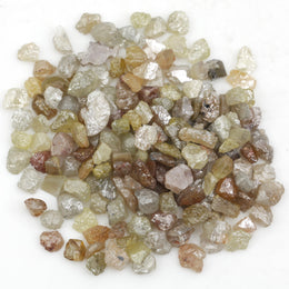 mixed color natural rough diamond pieces with varied raw textures for custom jewelry