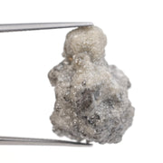grey color uncut rough diamond vs cut diamond