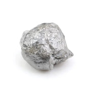raw rough diamond gemstone showcasing its original natural formation.