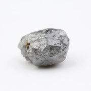 raw rough diamond gemstone showcasing its original natural formation.