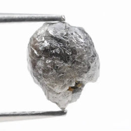 raw rough diamond gemstone showcasing its original natural formation.