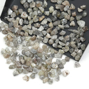 mixed color natural diamond chips showing varied raw uncut shapes for jewelry use