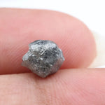 raw rough diamond gemstone showcasing its original natural formation.