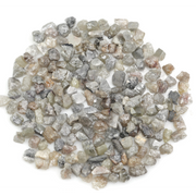 grey raw diamond with an uncut rough surface for jewelry making and custom designs