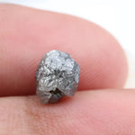 raw rough diamond gemstone showcasing its original natural formation.
