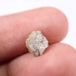 raw uncut diamond crystal showing natural rough diamond appearance yellow grey rough diamond 