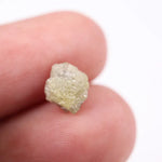 raw uncut diamond crystal showing natural rough diamond appearance yellow grey rough diamond 