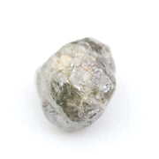 Collection of raw gems and loose rough diamonds.