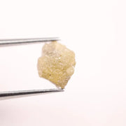 raw uncut diamond crystal showing natural rough diamond appearance yellow grey rough diamond 