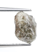 Collection of raw gems and loose rough diamonds.