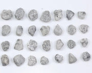 Grey diamond gemstone with natural smoky color and brilliant polish