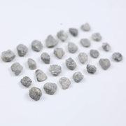 Grey diamond gemstone with natural smoky color and brilliant polish