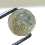 0.67 carat natural yellowish grey diamond round loose stone with subtle dual tone color