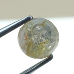 0.67 carat natural yellowish grey diamond round loose stone with subtle dual tone color