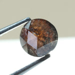 0.78 carat brownish black natural diamond round cut loose stone with subtle dual tone color blend