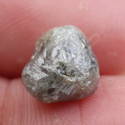 natural raw and rough diamonds, loose uncut diamond stones, white raw diamonds, rough diamond crystals, and raw diamond rings.