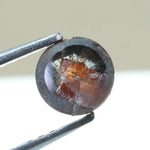 0.78 carat brownish black natural diamond round cut loose stone with subtle dual tone color blend