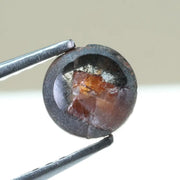 0.78 carat brownish black natural diamond round cut loose stone with subtle dual tone color blend