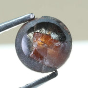 0.78 carat brownish black natural diamond round cut loose stone with subtle dual tone color blend