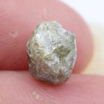 Rough lab grown diamond crystal with uncut finish.
