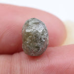 Natural raw diamond ring with rough diamond centerpiece.