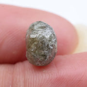 Natural raw diamond ring with rough diamond centerpiece.