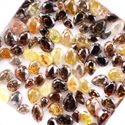 Natural fancy color pear shape rose cut diamond lot featuring mixed shades of brown, yellow and champagne loose diamonds, ideal for custom jewelry making, artisan rings, earrings and unique gemstone designs.