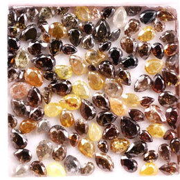 Natural fancy color pear shape rose cut diamond lot featuring mixed shades of brown, yellow and champagne loose diamonds, ideal for custom jewelry making, artisan rings, earrings and unique gemstone designs.