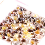 Natural fancy color pear shape rose cut diamond lot featuring mixed shades of brown, yellow and champagne loose diamonds, ideal for custom jewelry making, artisan rings, earrings and unique gemstone designs.