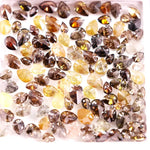 Natural fancy color pear shape rose cut diamond lot featuring mixed shades of brown, yellow and champagne loose diamonds, ideal for custom jewelry making, artisan rings, earrings and unique gemstone designs.